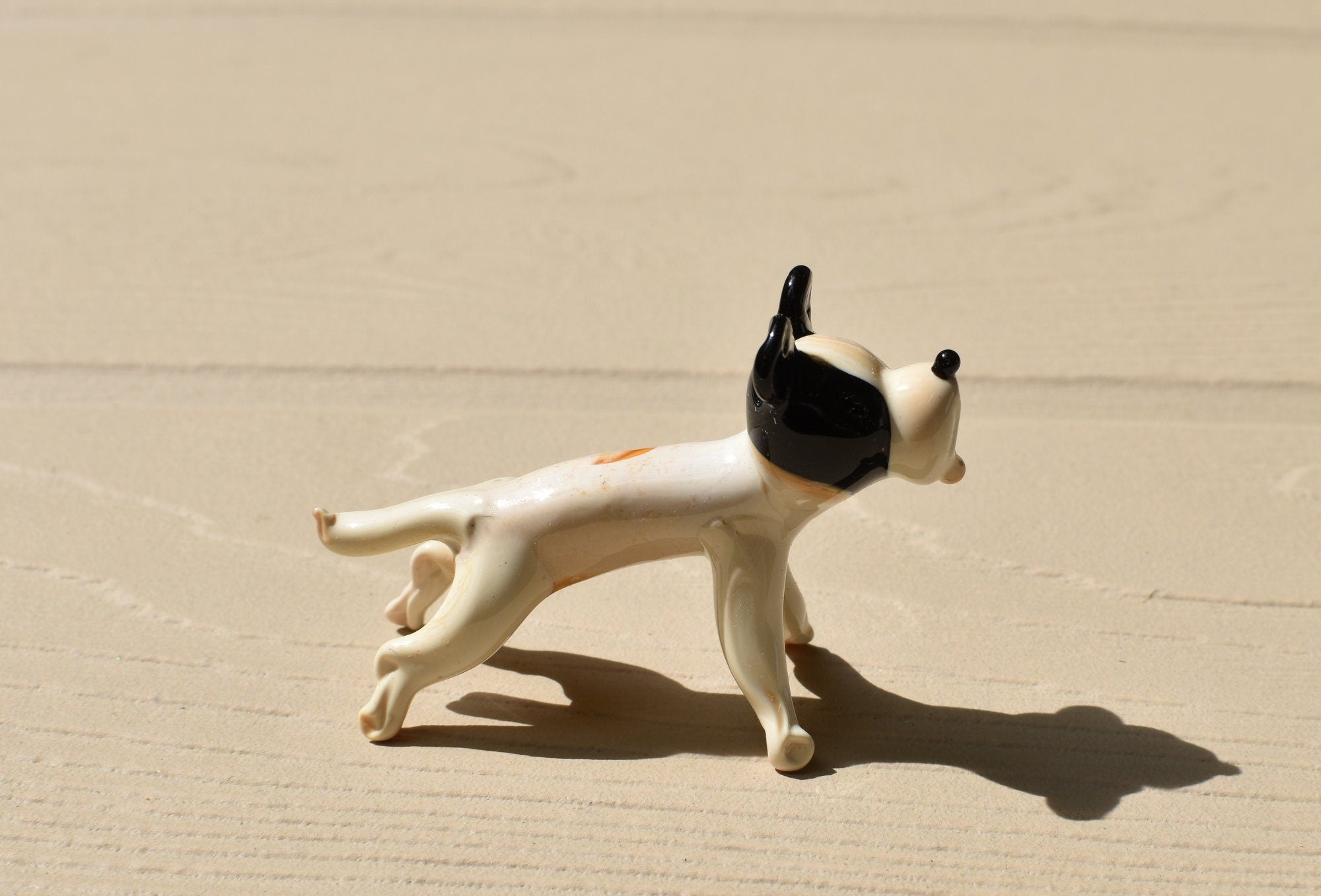 Cute Glass dog. Whimsical figurine, lots of character and personality. Excellent addition to your glass menagerie collection.