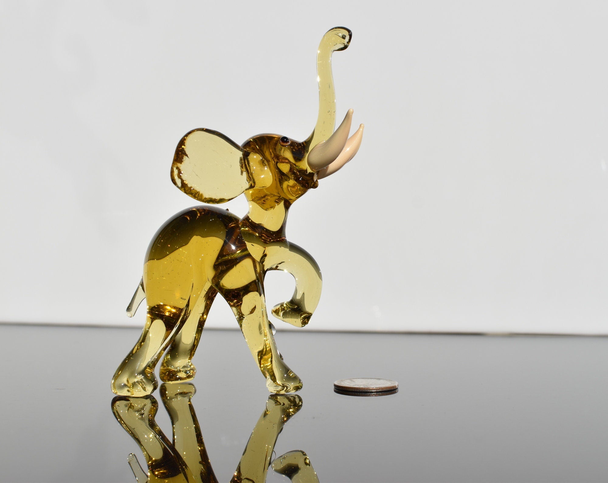 Amber Glass Elephant Figurine: Whimsical Handmade Sculpture