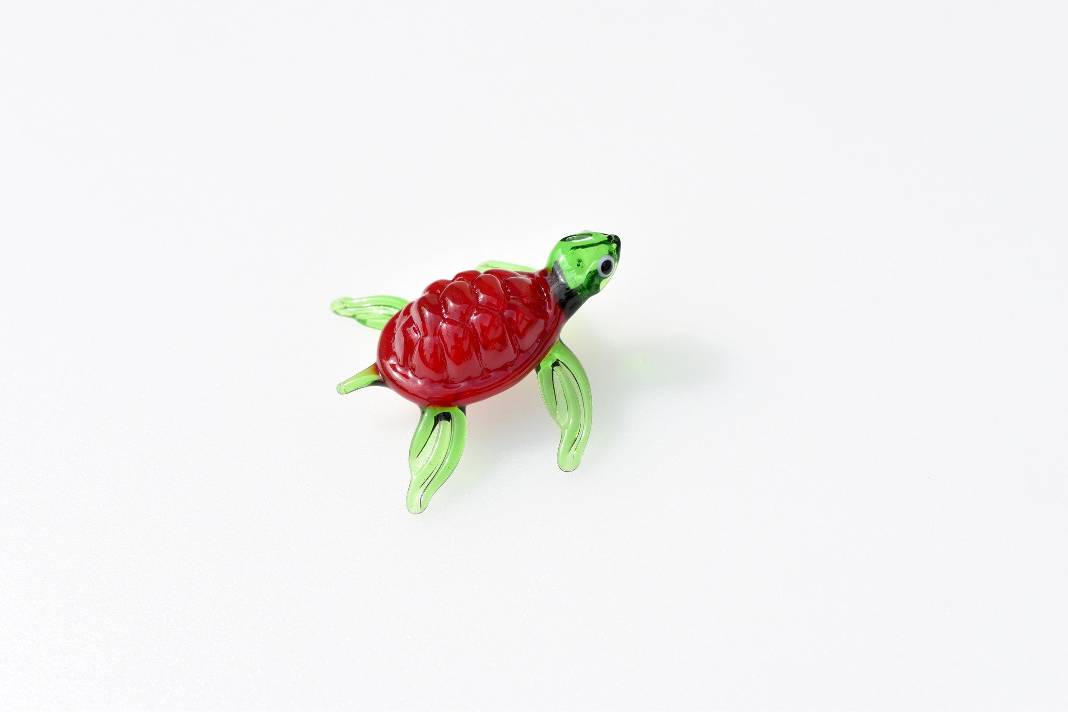 Red Glass Sea Turtle. Detailed figurine with a lot of character and personality. Excellent addition to you glass menagerie collection
