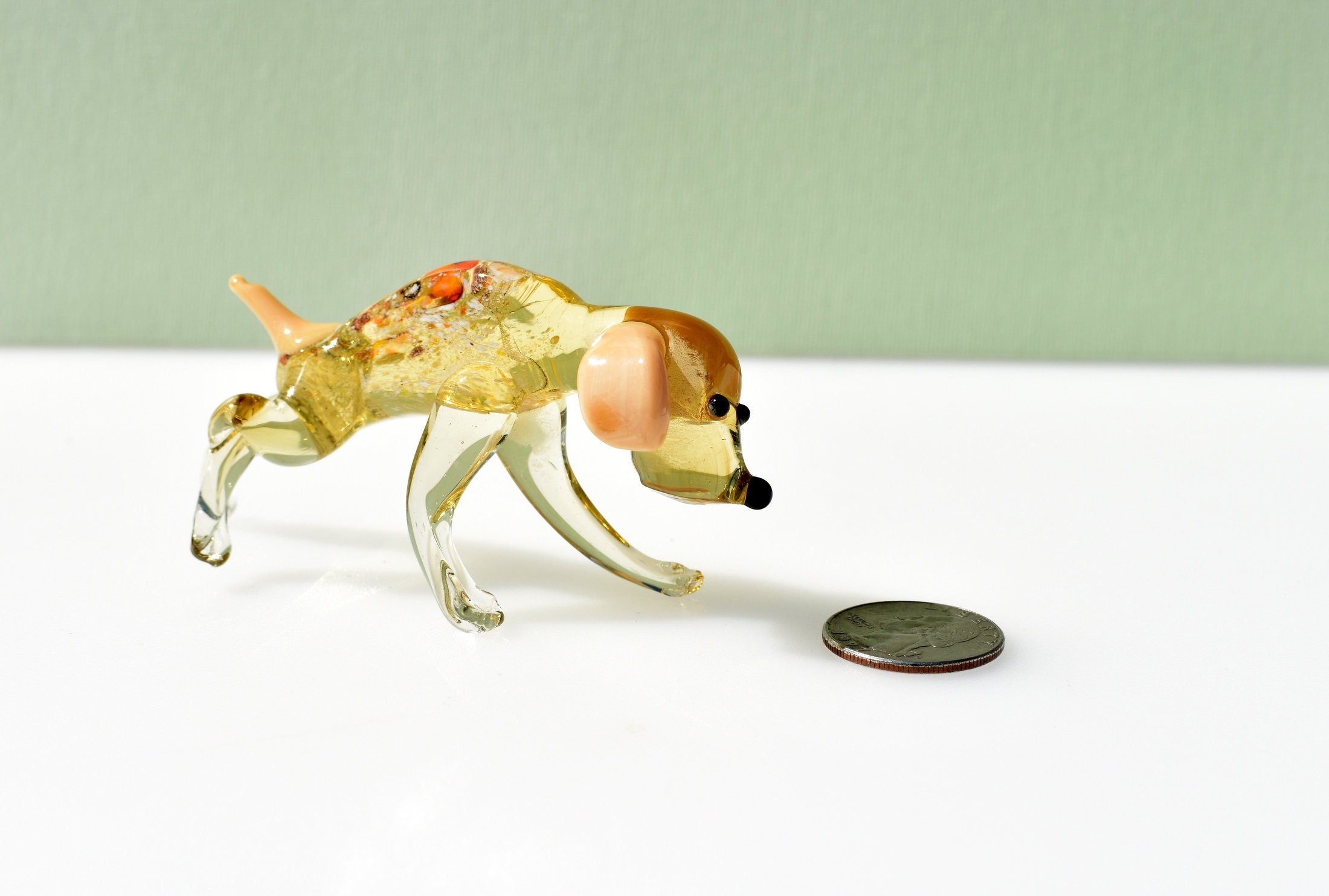 Hunting dog. Detailed realistic figurine with a lot of personality. Excellent addition to glass collection.