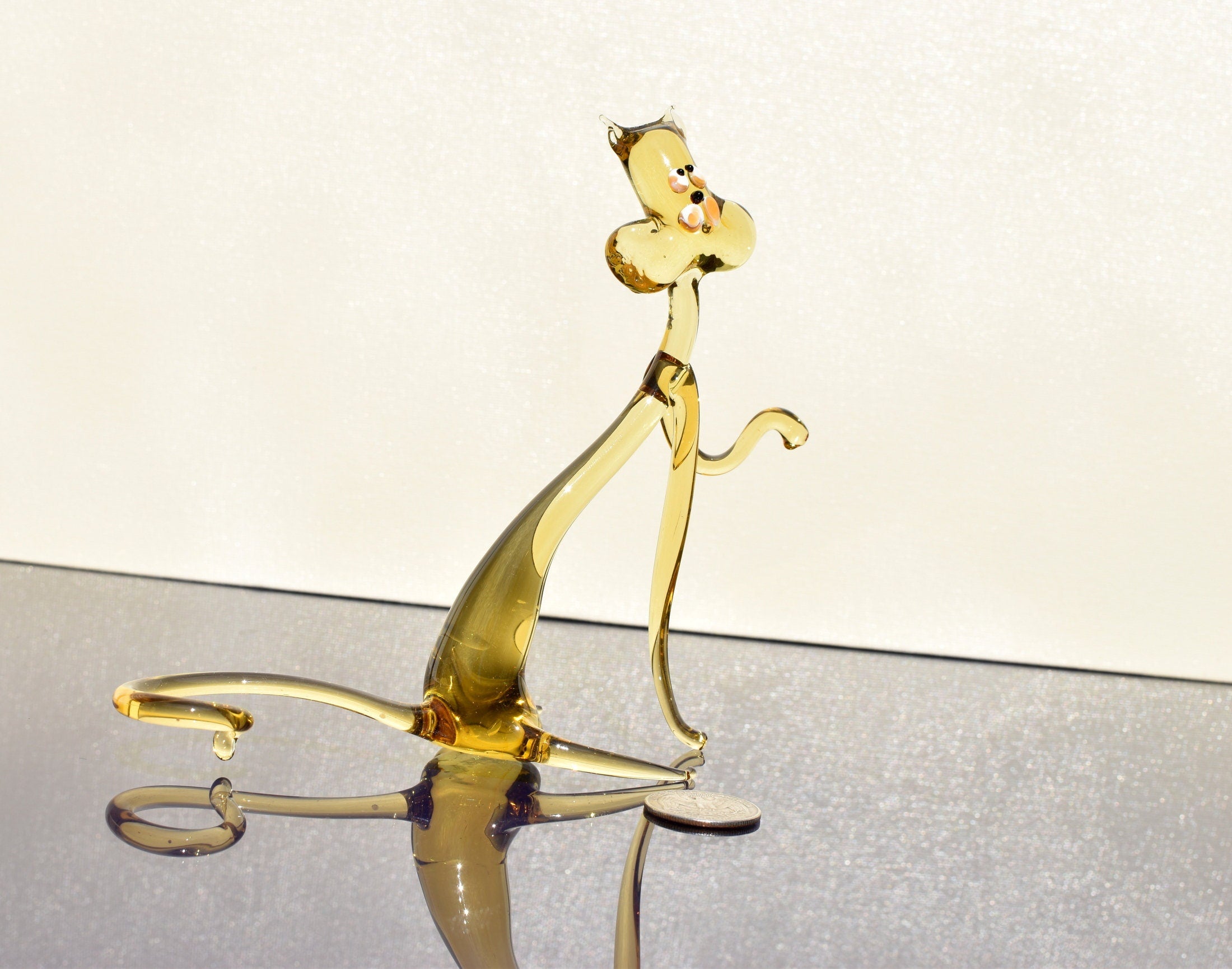 Amber Glass Yoga Cat, whimsical cheerful character for your glass menagerie.