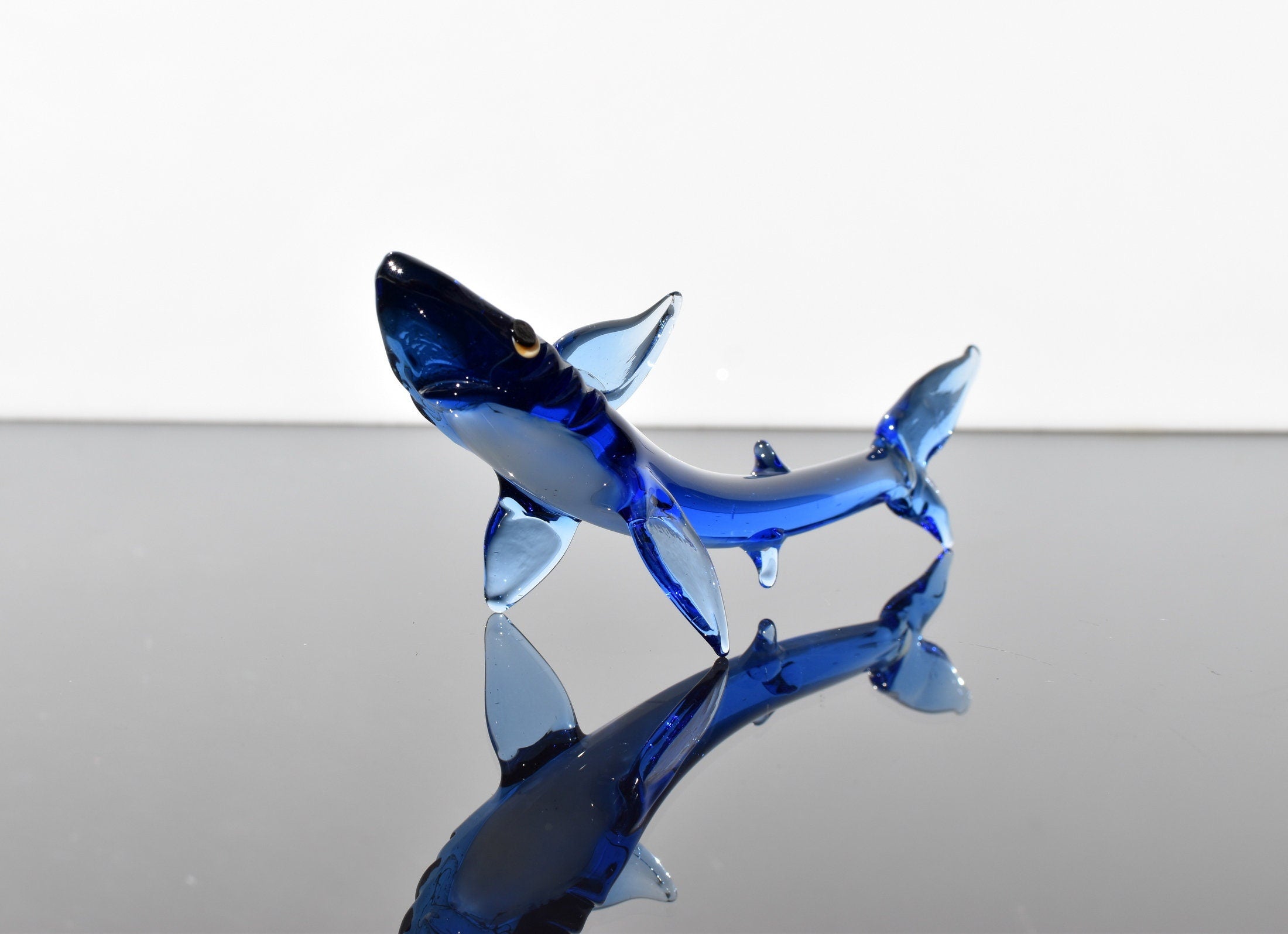 Glass statue of Shark. Detailed figurine with a lot of personality. Excellent addition to your glass menagerie collection.