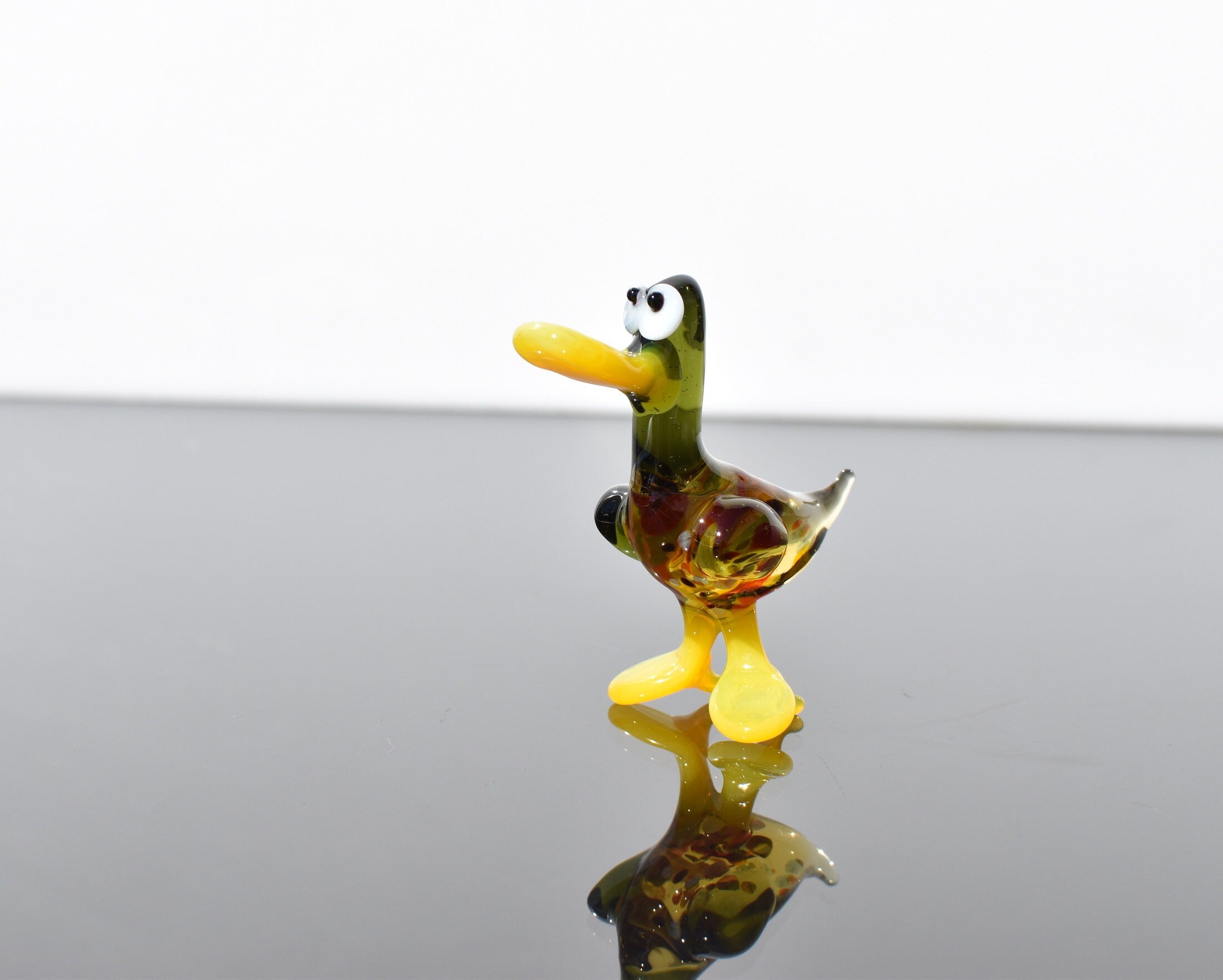 Cute Glass Duck. Whimsical figurine with a lot of character and personality. Excellent addition to your glass menagerie collection.