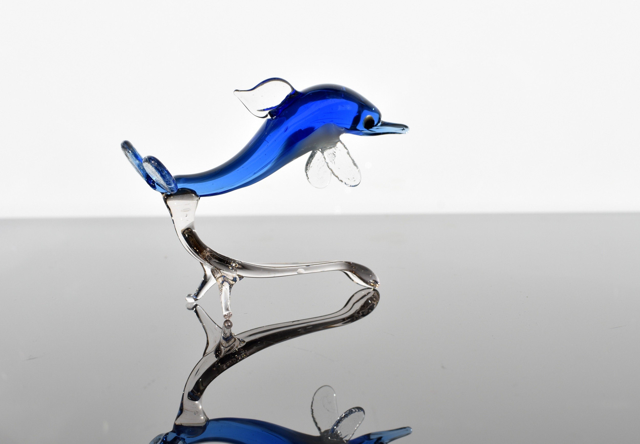 Blue Glass Dolphin Figurine: Hand-Blown Whimsical Sculpture