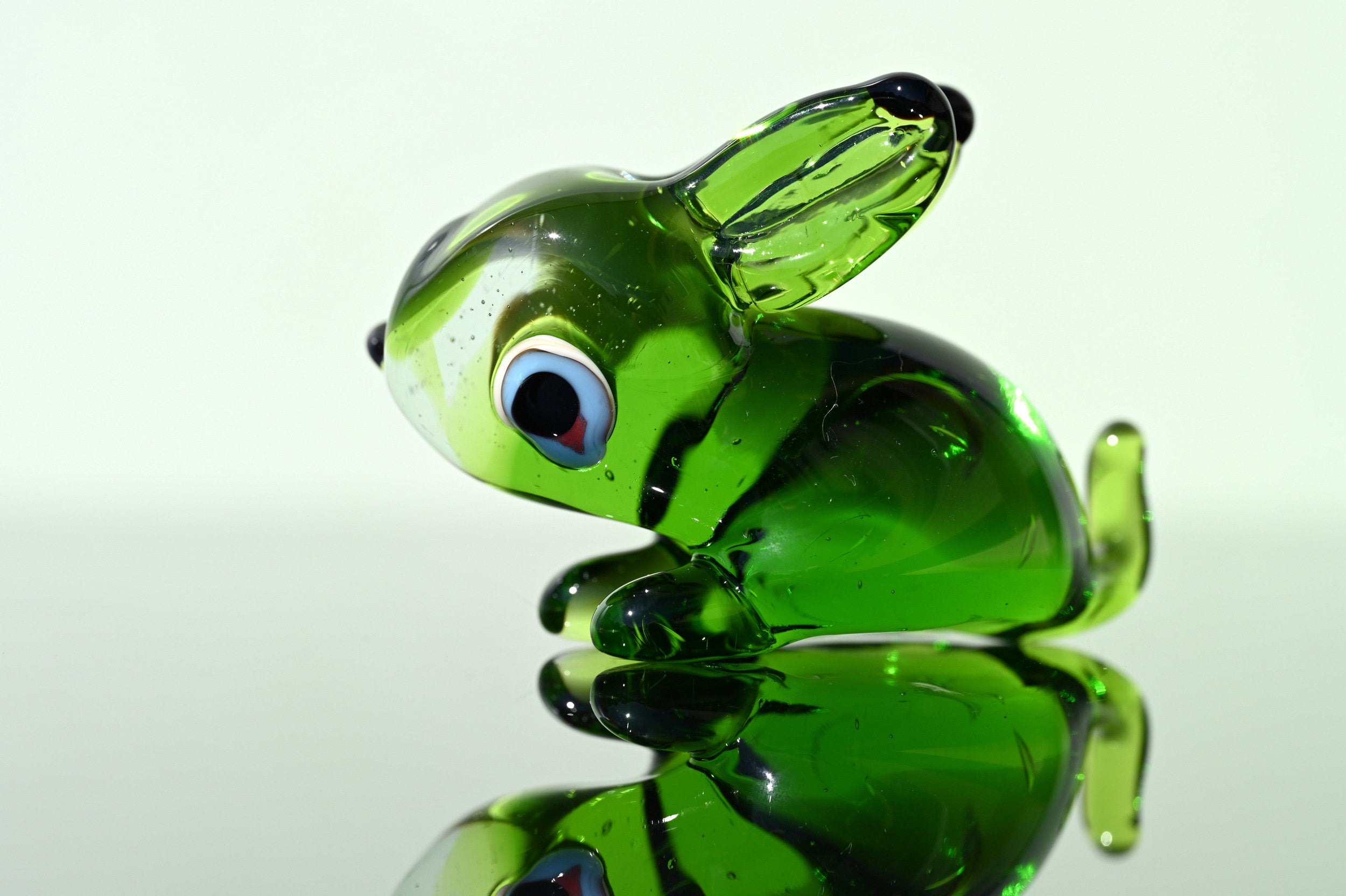 Cute Green Glass Bunny. Detailed figurine with a lot of personality. Excellent addition to your glass menagerie collection.