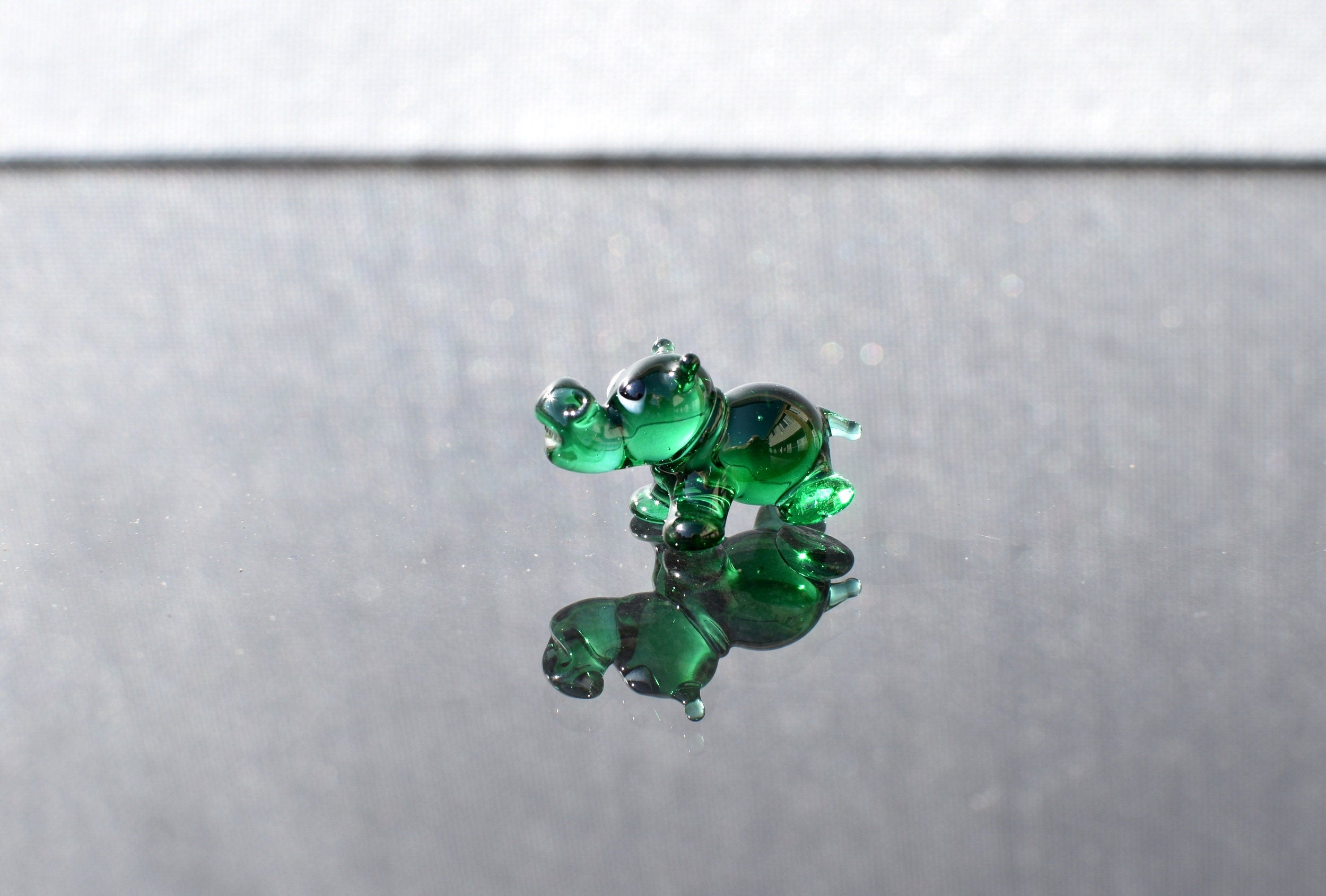 Tiny Green Glass Hippo – Handcrafted Miniature Hippopotamus Figurine