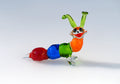 Lampwork Glass Caterpillar: Multicolored Whimsical Sculpture