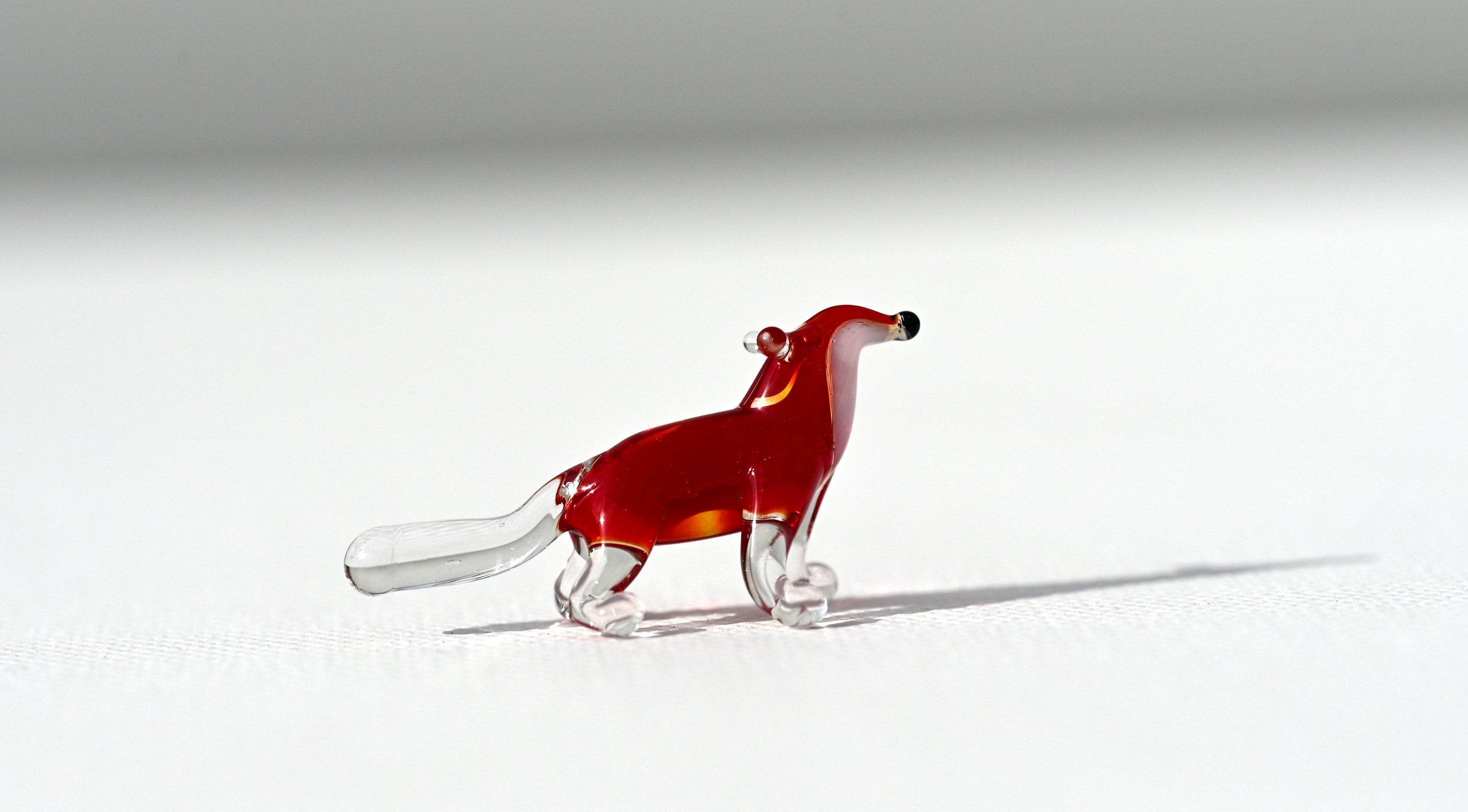 Handmade Red Glass Fox Figurine: Whimsical Animal Sculpture