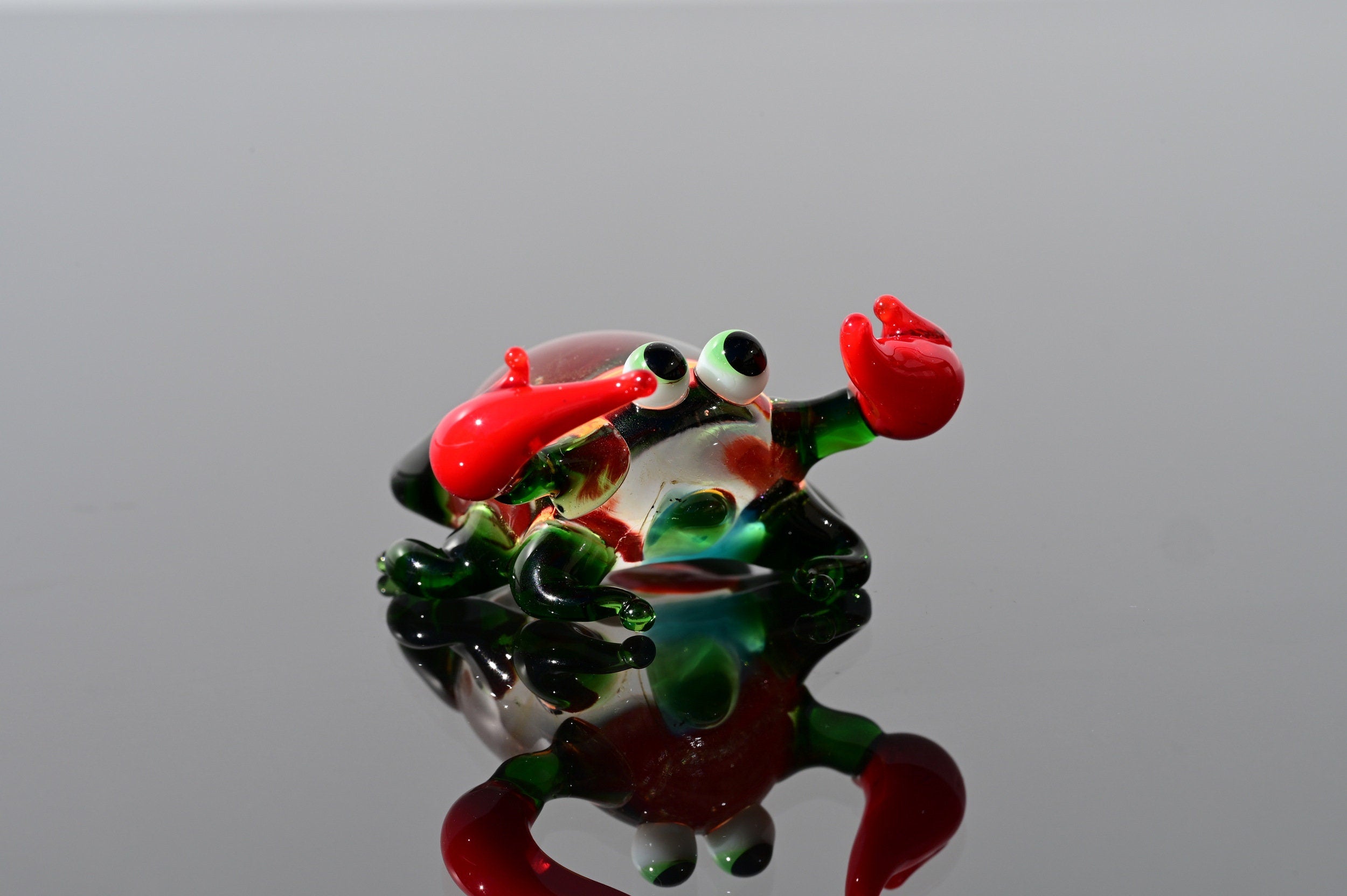 Handmade Glass Crab Figurine: Whimsical Clear-Green Sculpture