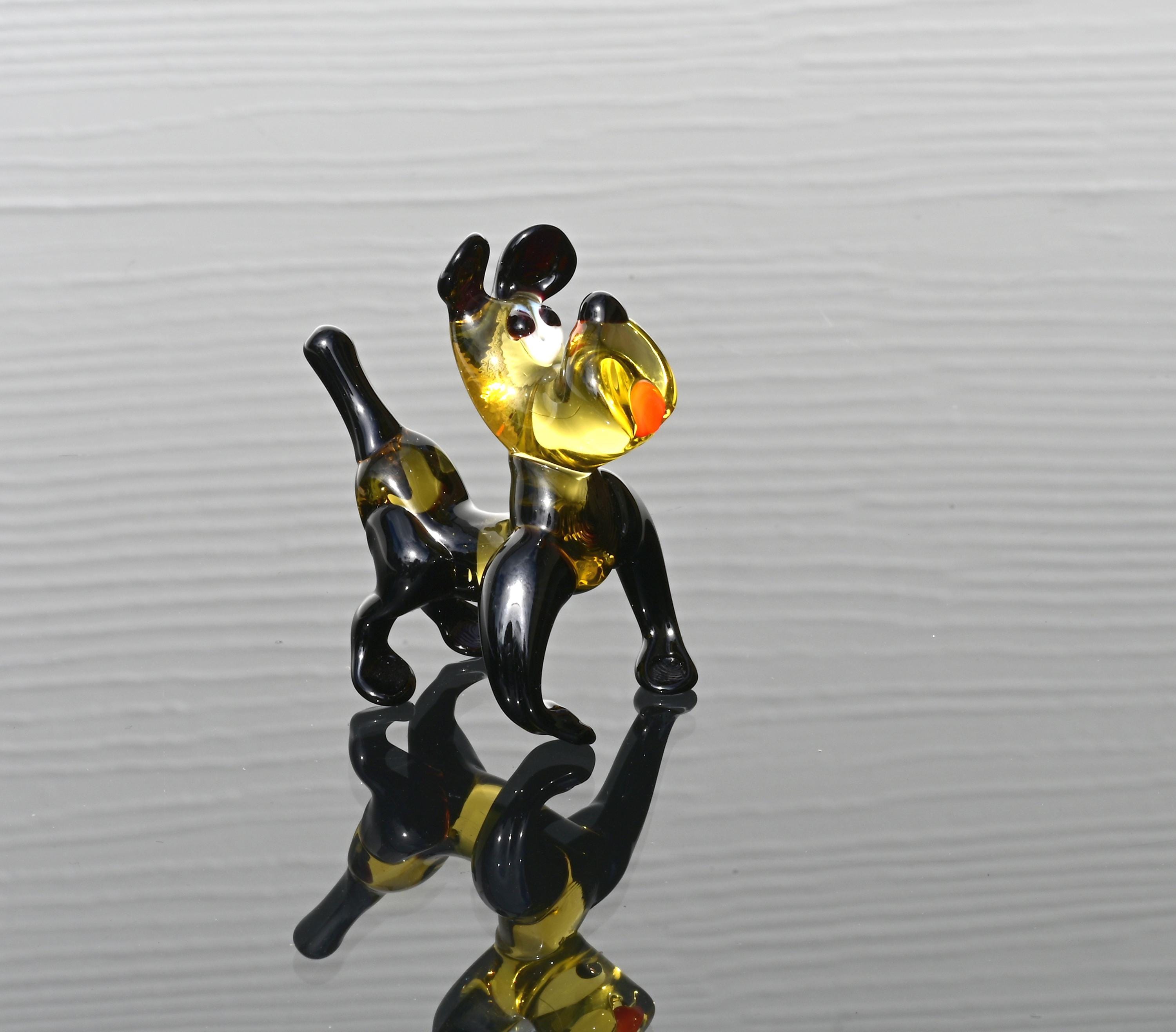 Cartoonish hand-blown glass Bulldog. Detailed figurine with character and personality. Excellent addition to your collection.