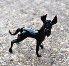 Black Glass Great Dane. Detailed figurine with a lot of character and personality.  Excellent addition to your glass menagerie collection.