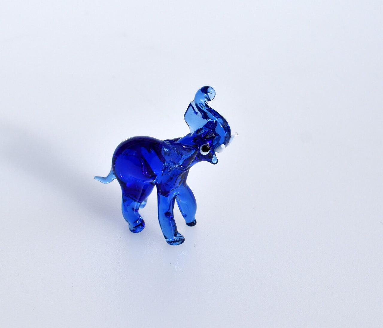 Handmade Cobalt Blue Glass Elephant Figurine: Whimsical Art Glass Sculpture