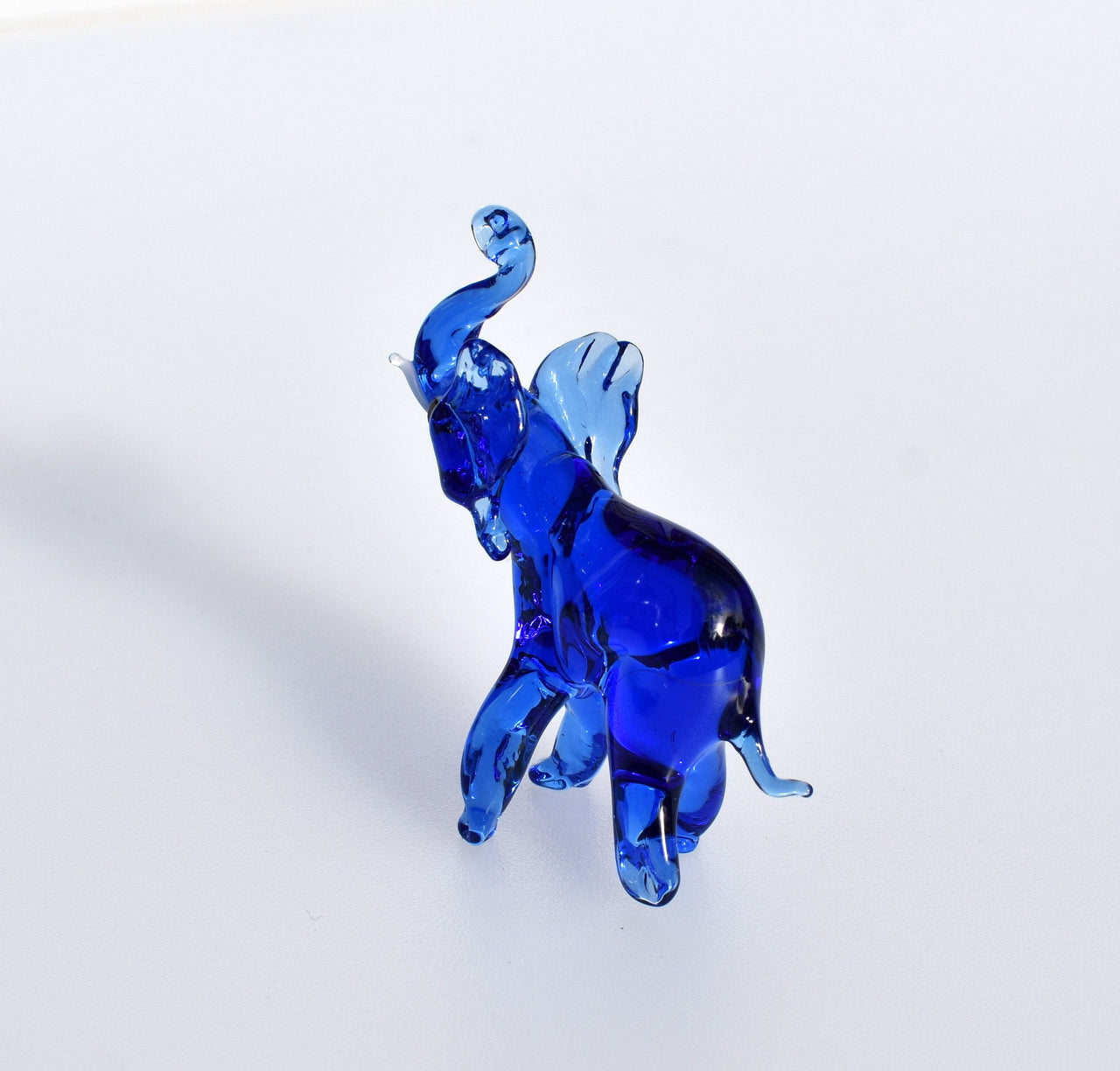 Handmade Cobalt Blue Glass Elephant Figurine: Whimsical Art Glass Sculpture