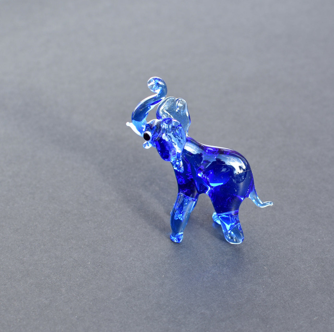 Handmade Cobalt Blue Glass Elephant Figurine: Whimsical Art Glass Sculpture
