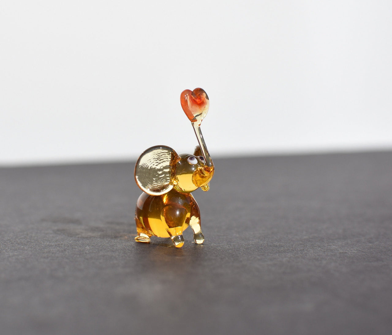 Tiny Glass Elephant Miniature: Whimsical Heart Figurine