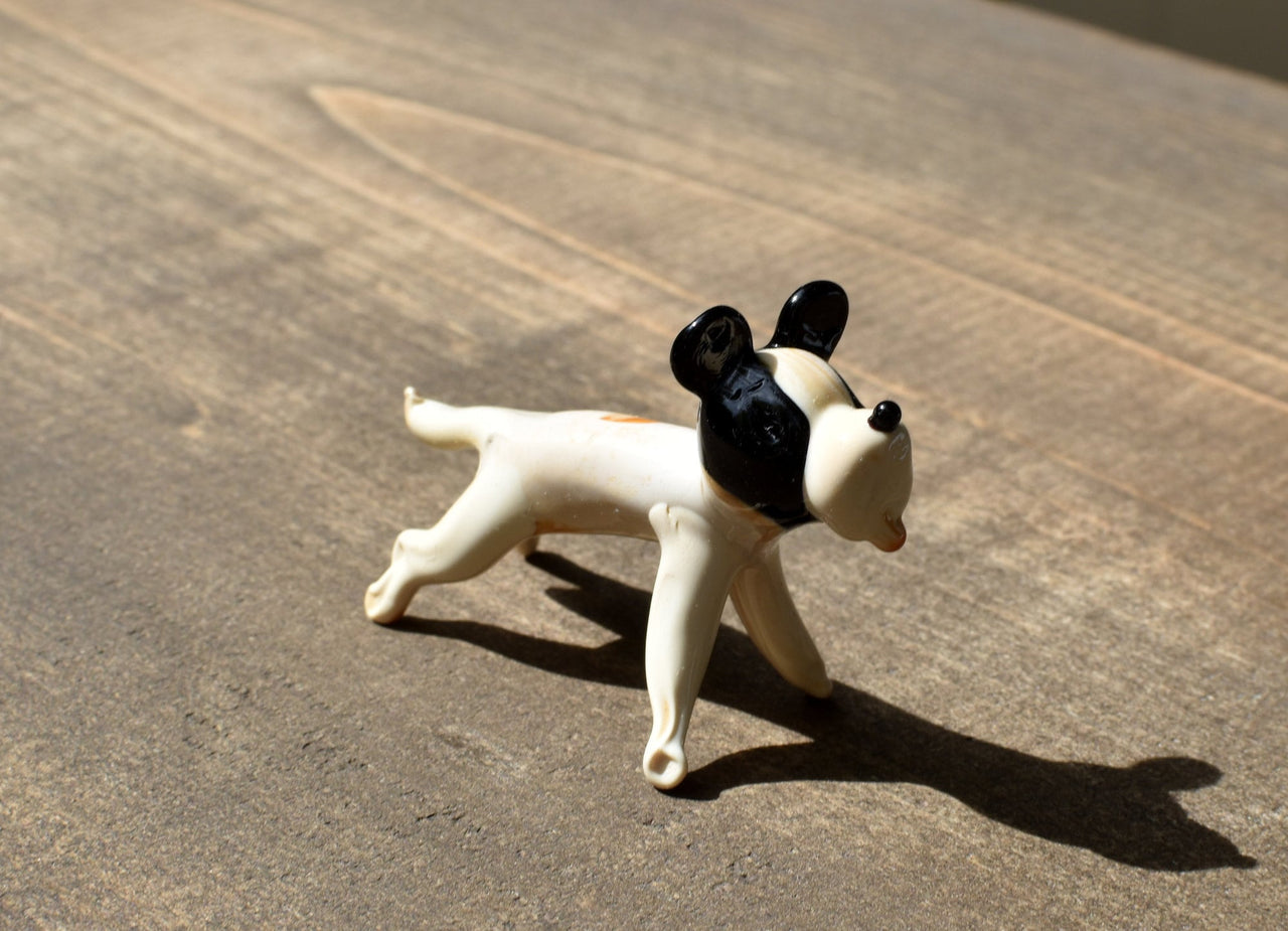 Cute Glass dog. Whimsical figurine, lots of  character and personality. Excellent addition to your glass menagerie collection.