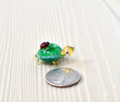 Tiny Green Glass Turtle with Ladybug – Handcrafted Miniature Animal Figurine