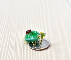 Tiny Green Glass Turtle with Ladybug – Handcrafted Miniature Animal Figurine