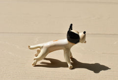 Cute Glass dog. Whimsical figurine, lots of  character and personality. Excellent addition to your glass menagerie collection.