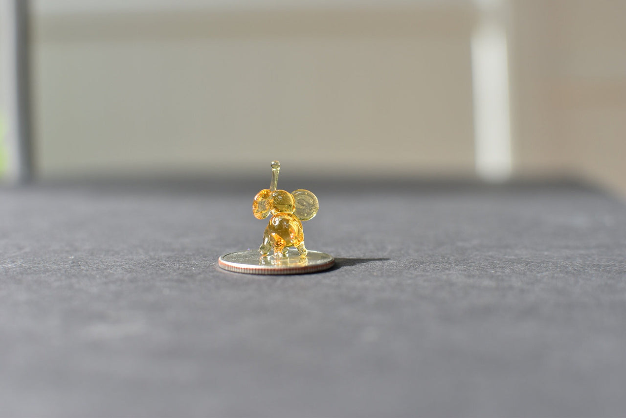 Tiny Lampwork Glass Elephant Miniature: Whimsical Collectible Figurine