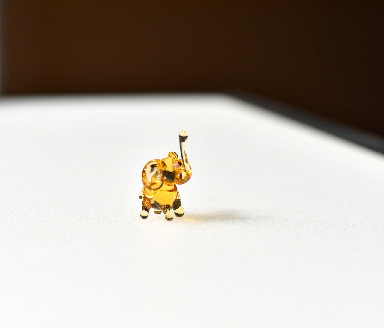 Tiny Lampwork Glass Elephant Miniature: Whimsical Collectible Figurine