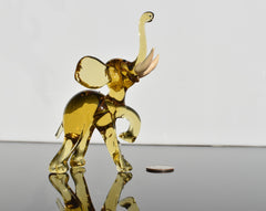 Amber Glass Elephant Figurine: Whimsical Handmade Sculpture