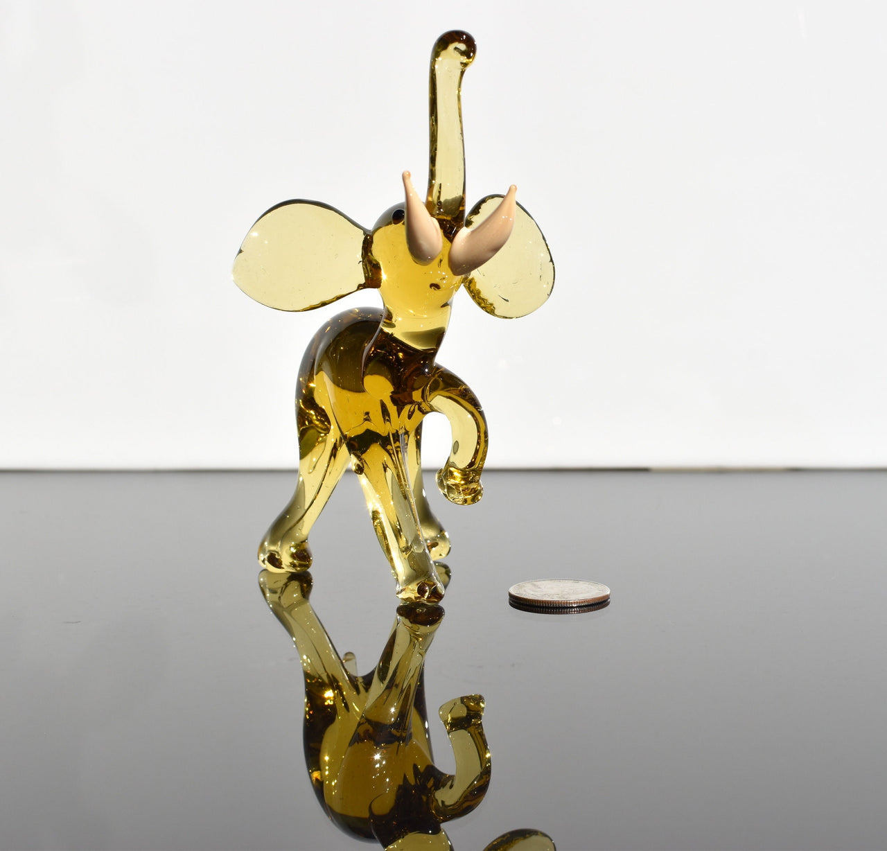 Amber Glass Elephant Figurine: Whimsical Handmade Sculpture