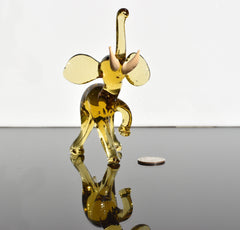 Amber Glass Elephant Figurine: Whimsical Handmade Sculpture