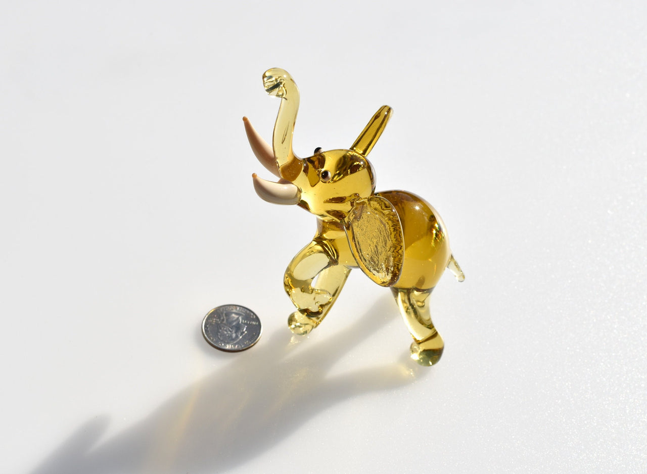 Amber Glass Elephant Figurine: Whimsical Handmade Sculpture