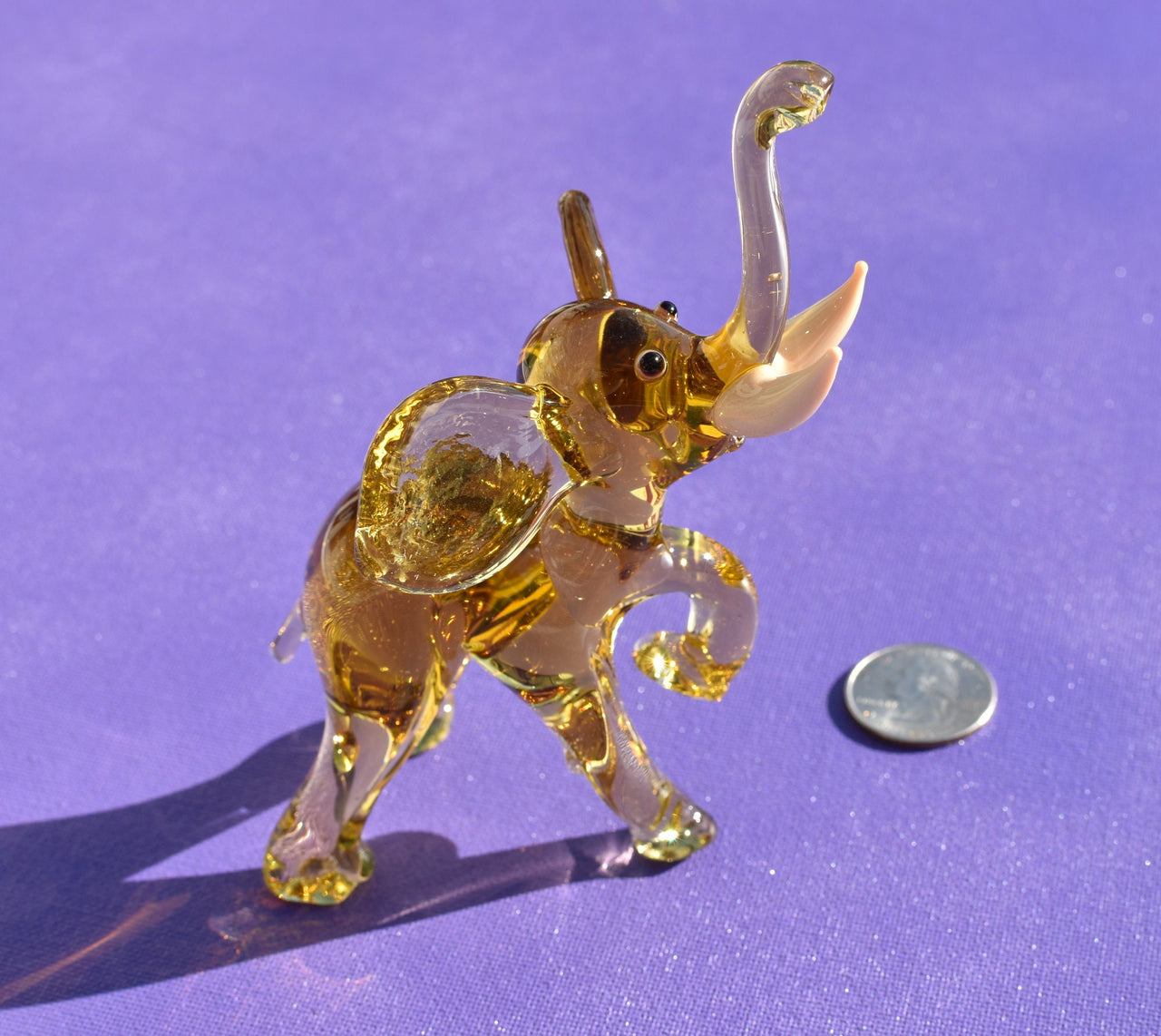 Amber Glass Elephant Figurine: Whimsical Handmade Sculpture