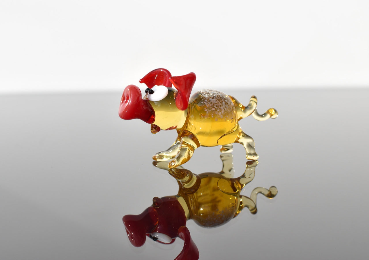 Cute glass pig. Whimsical figurine; lot of character and personality. Excellent addition to your glass collection, unique gift.