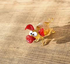 Cute glass pig. Whimsical figurine; lot of character and personality. Excellent addition to your glass collection, unique gift.