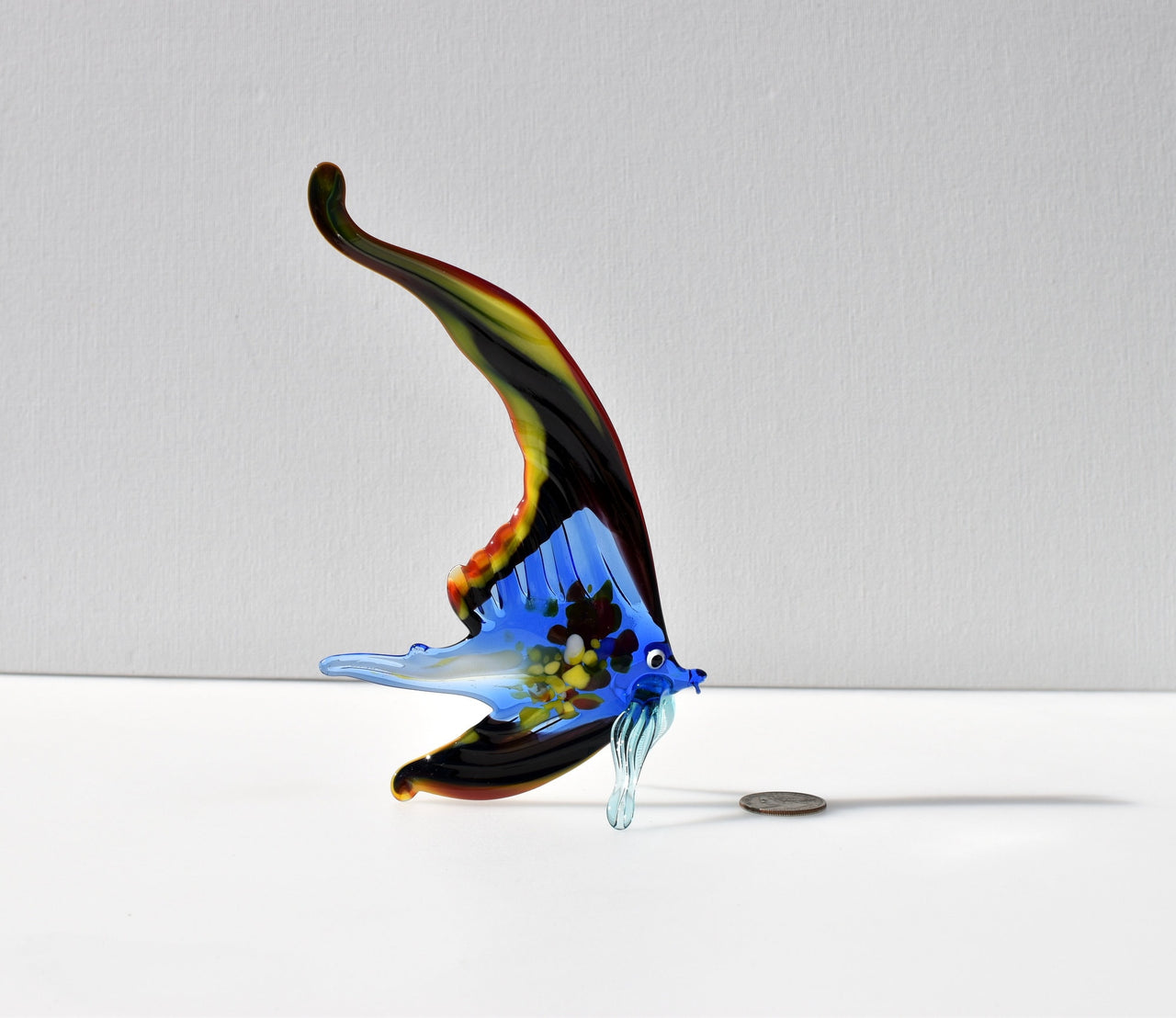 Gorgeous multicolor  Glass Fish. Whimsical figurine with a lot of character and personality. Excellent addition to you glass collection