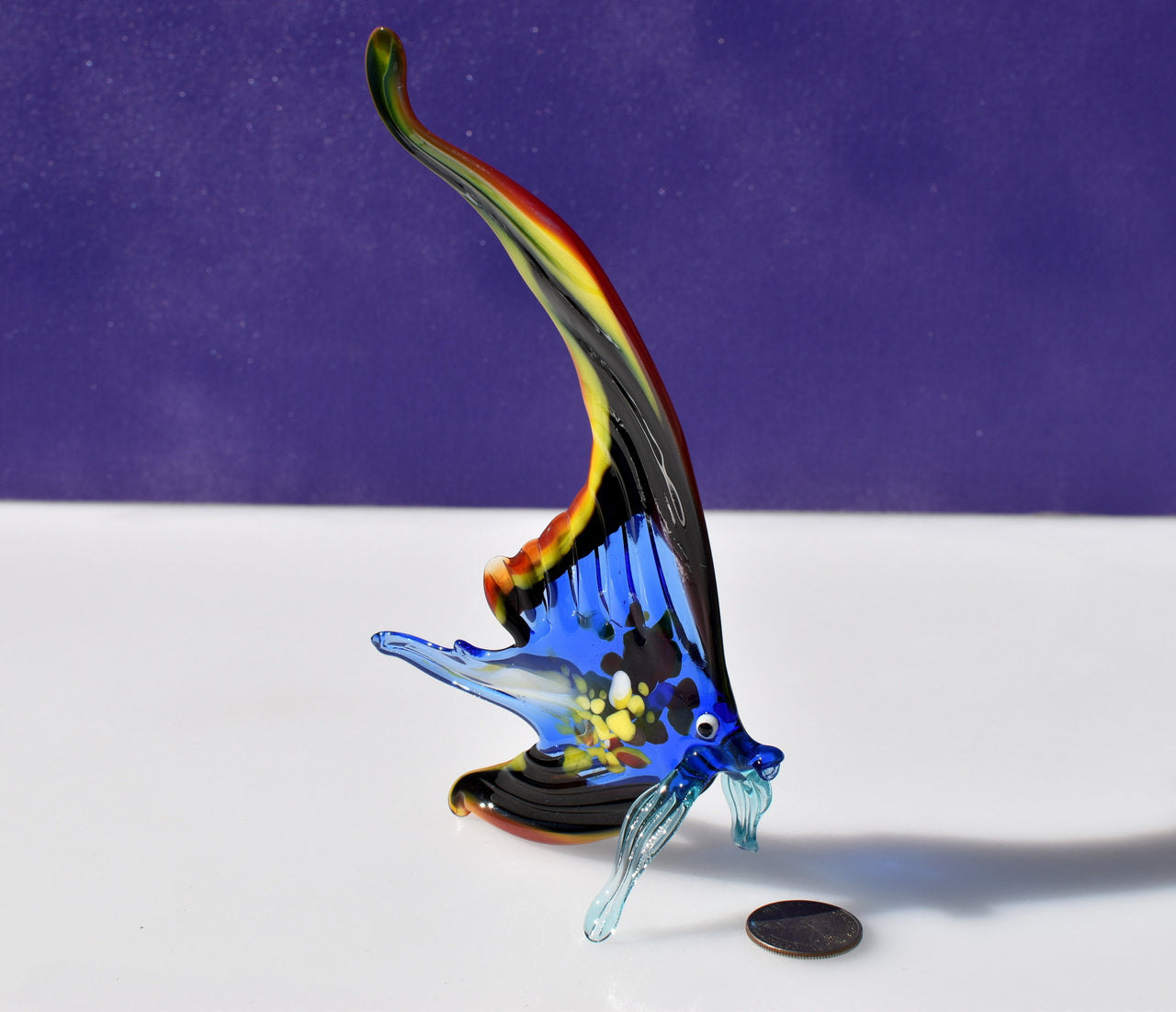 Gorgeous multicolor  Glass Fish. Whimsical figurine with a lot of character and personality. Excellent addition to you glass collection