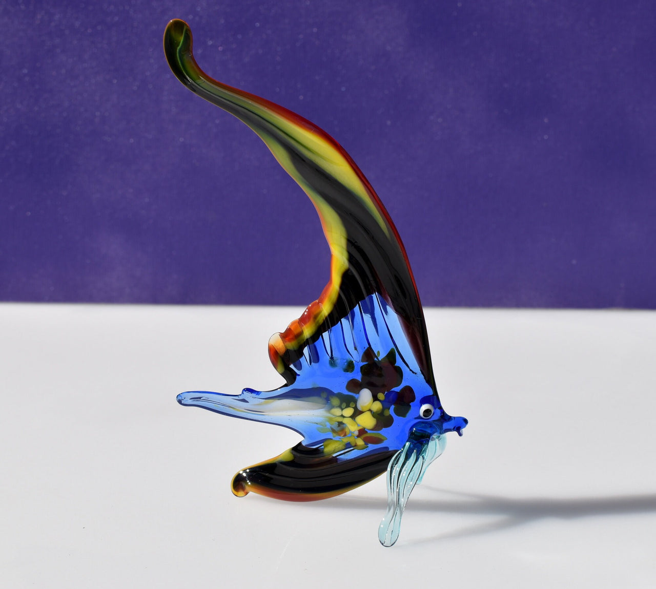 Gorgeous multicolor  Glass Fish. Whimsical figurine with a lot of character and personality. Excellent addition to you glass collection