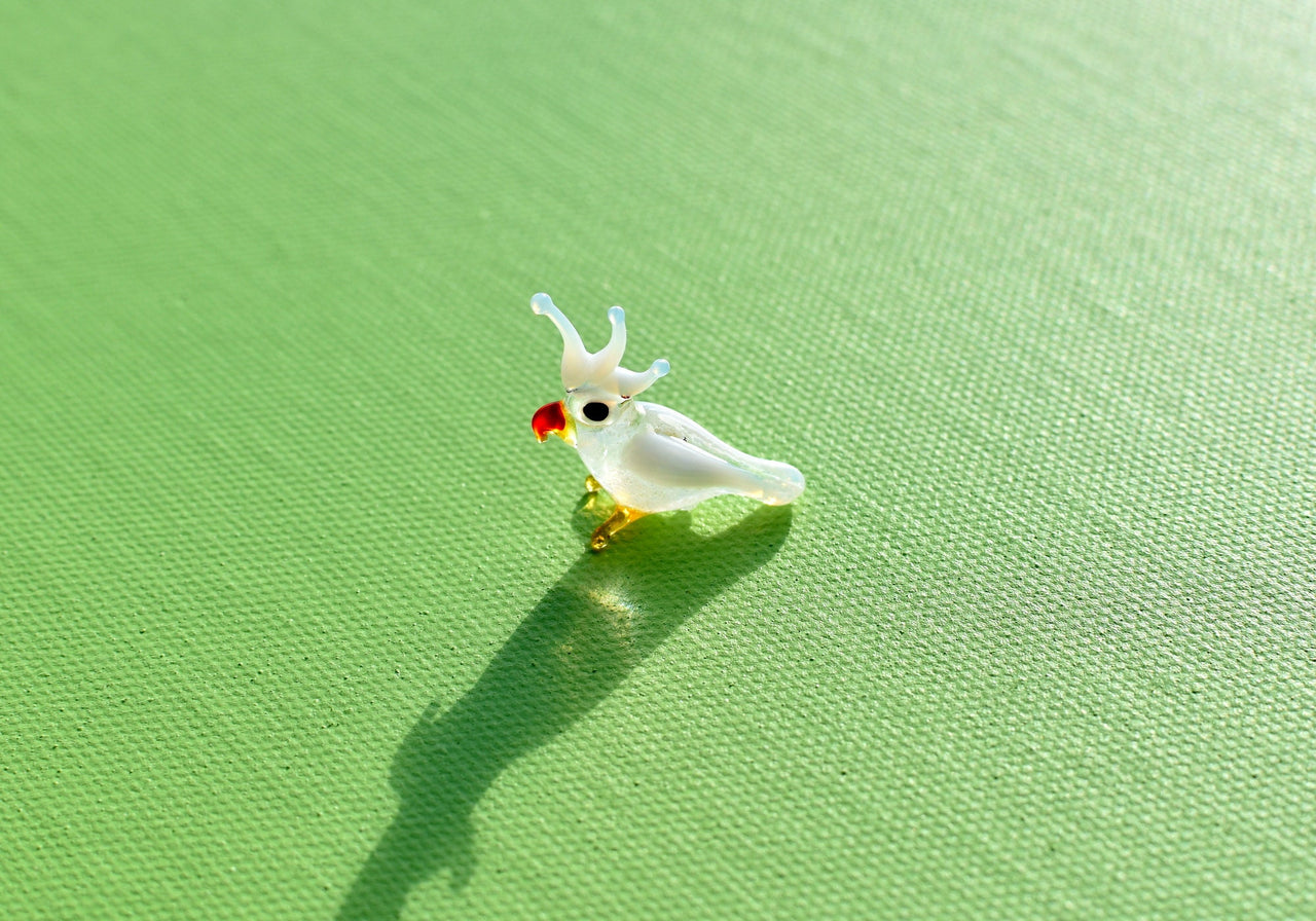 Handmade Glass Cockatoo Figurine: Whimsical Miniature Parrot Sculpture