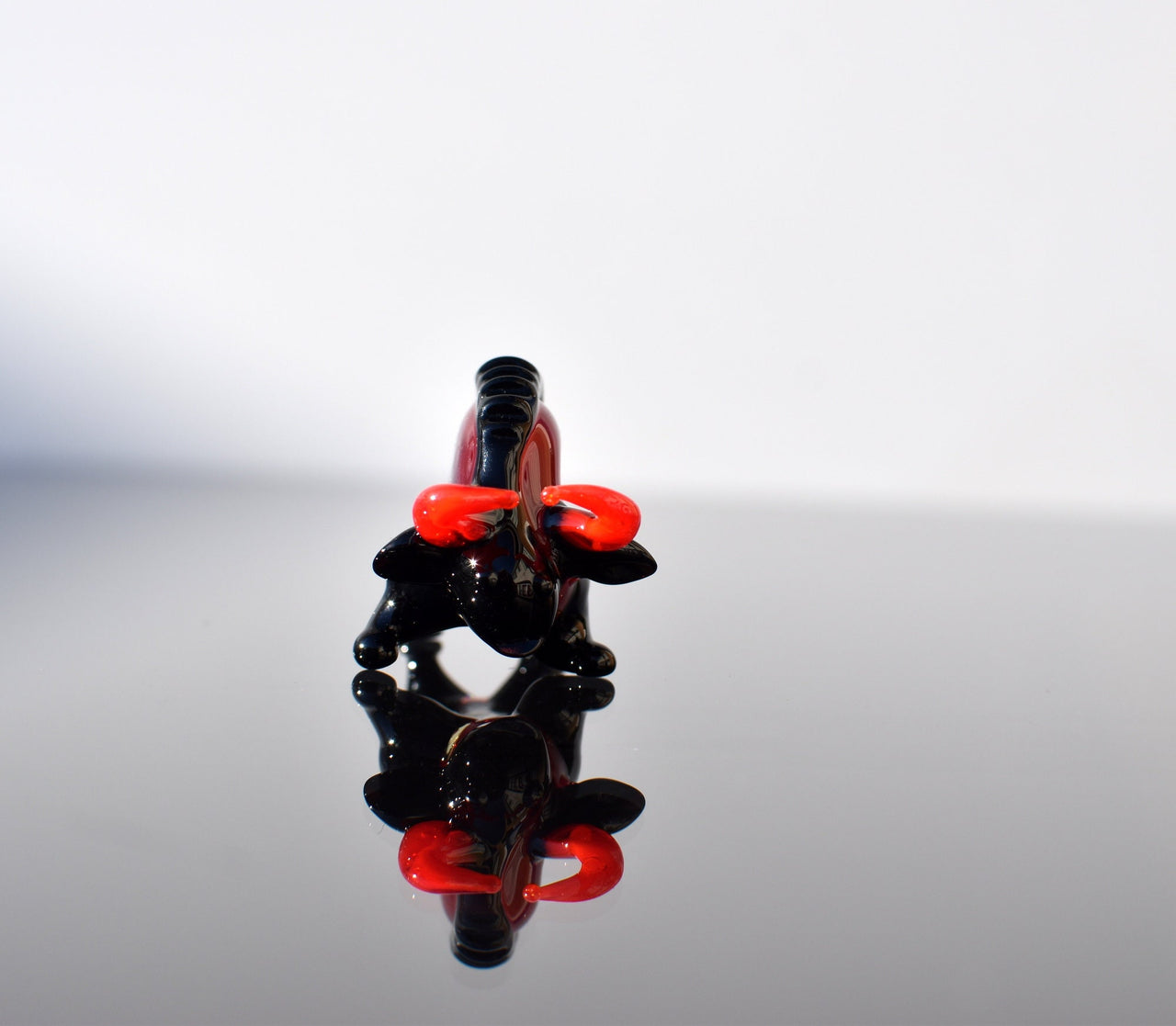 Flame Worked Glass Bull Figurine: Black and Red Art Glass Sculpture