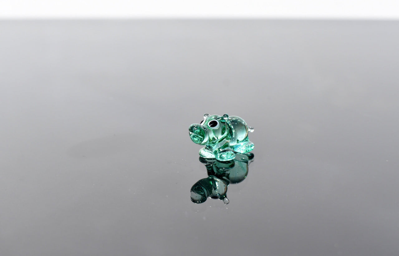 World's smallest turquoise glass Hippopotamus, whimsical, Lamp work miniature  Hippo character, Unique gift.