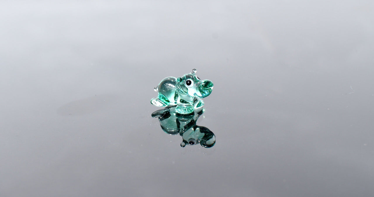 World's smallest turquoise glass Hippopotamus, whimsical, Lamp work miniature  Hippo character, Unique gift.