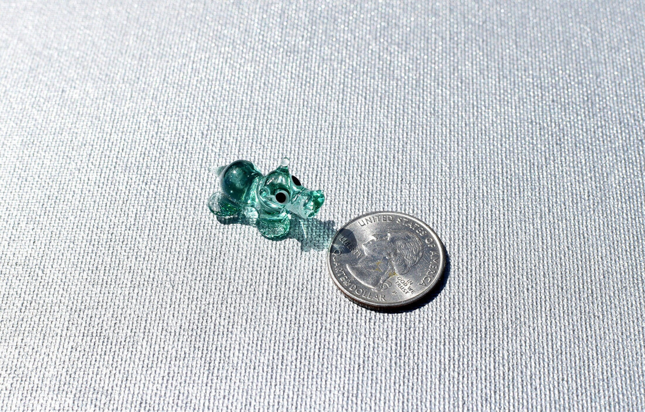 World's smallest turquoise glass Hippopotamus, whimsical, Lamp work miniature  Hippo character, Unique gift.