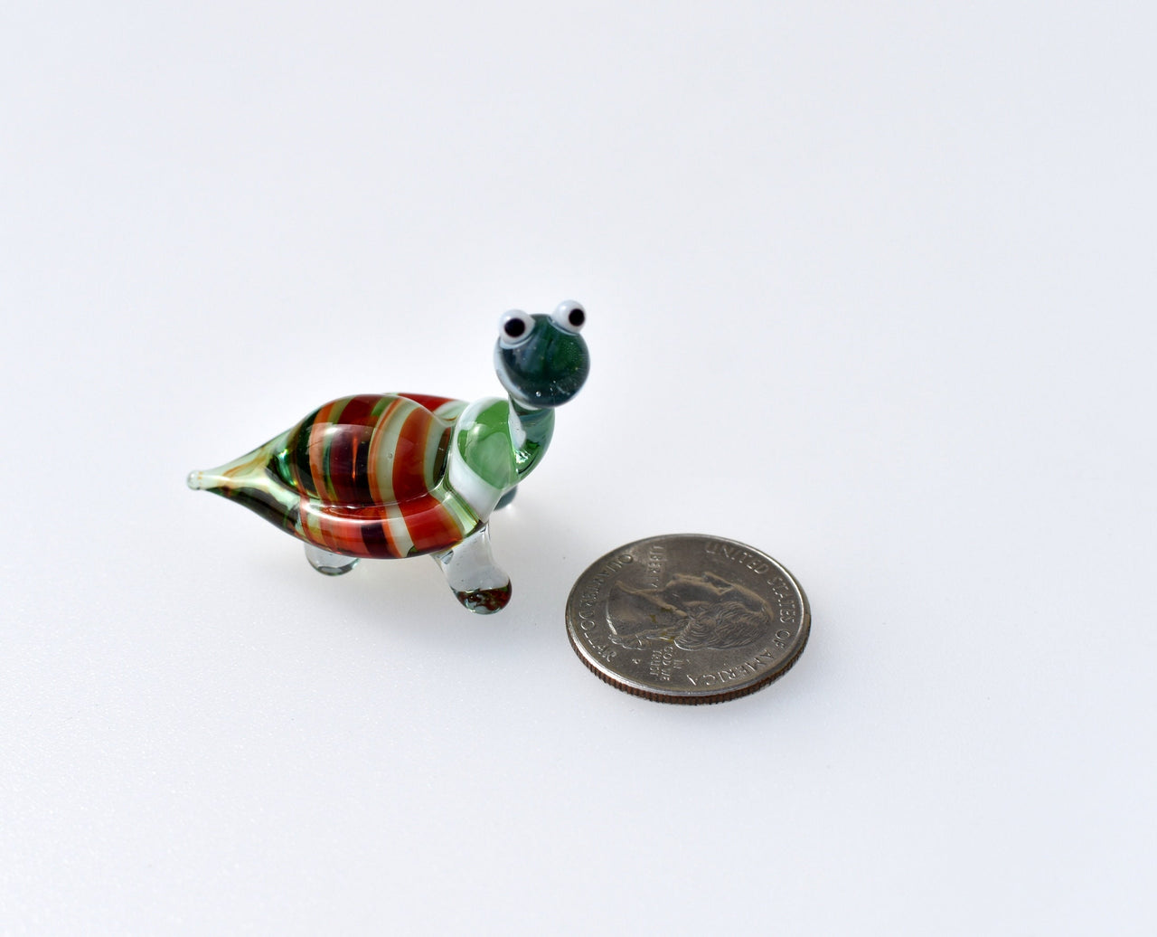 Cute glass turtle. Whimsical figurine; lot of character and personality. Excellent addition to your glass collection, unique gift.
