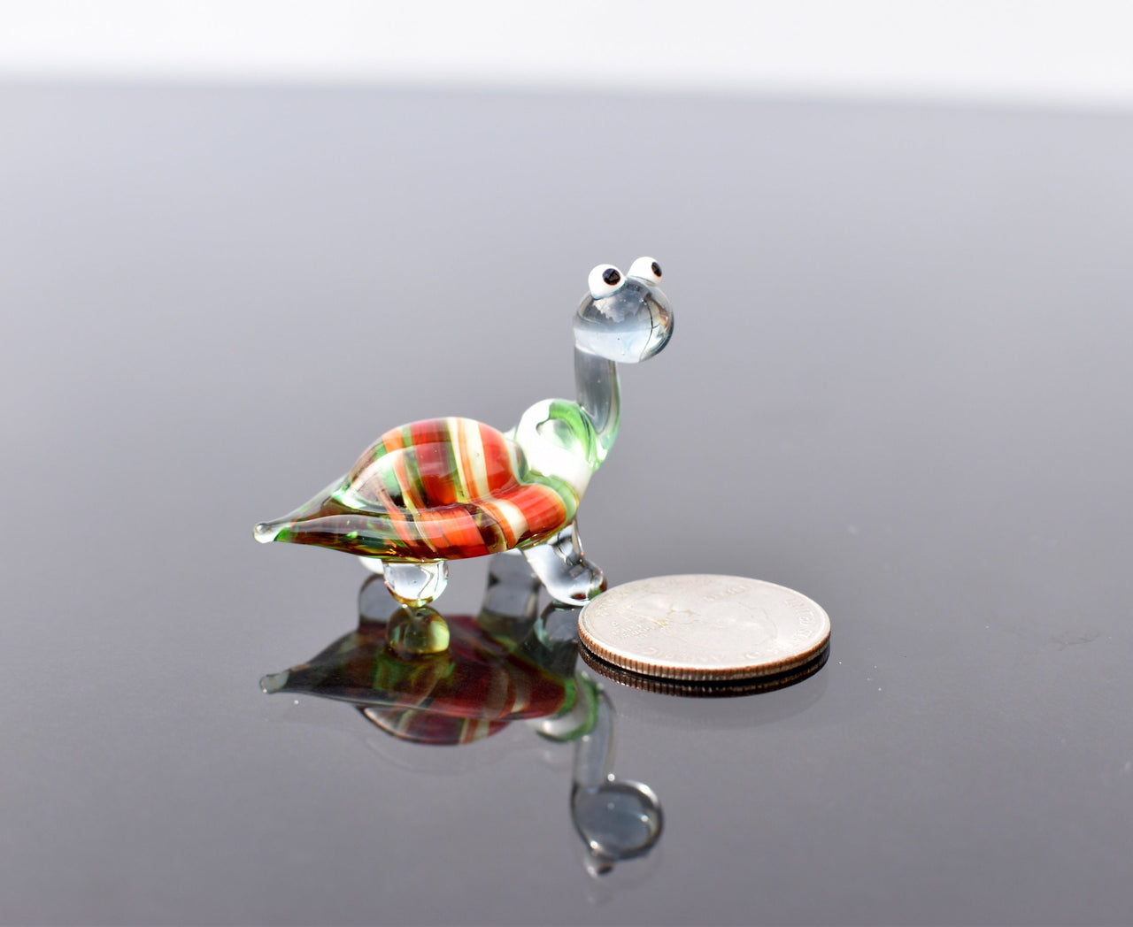 Cute glass turtle. Whimsical figurine; lot of character and personality. Excellent addition to your glass collection, unique gift.