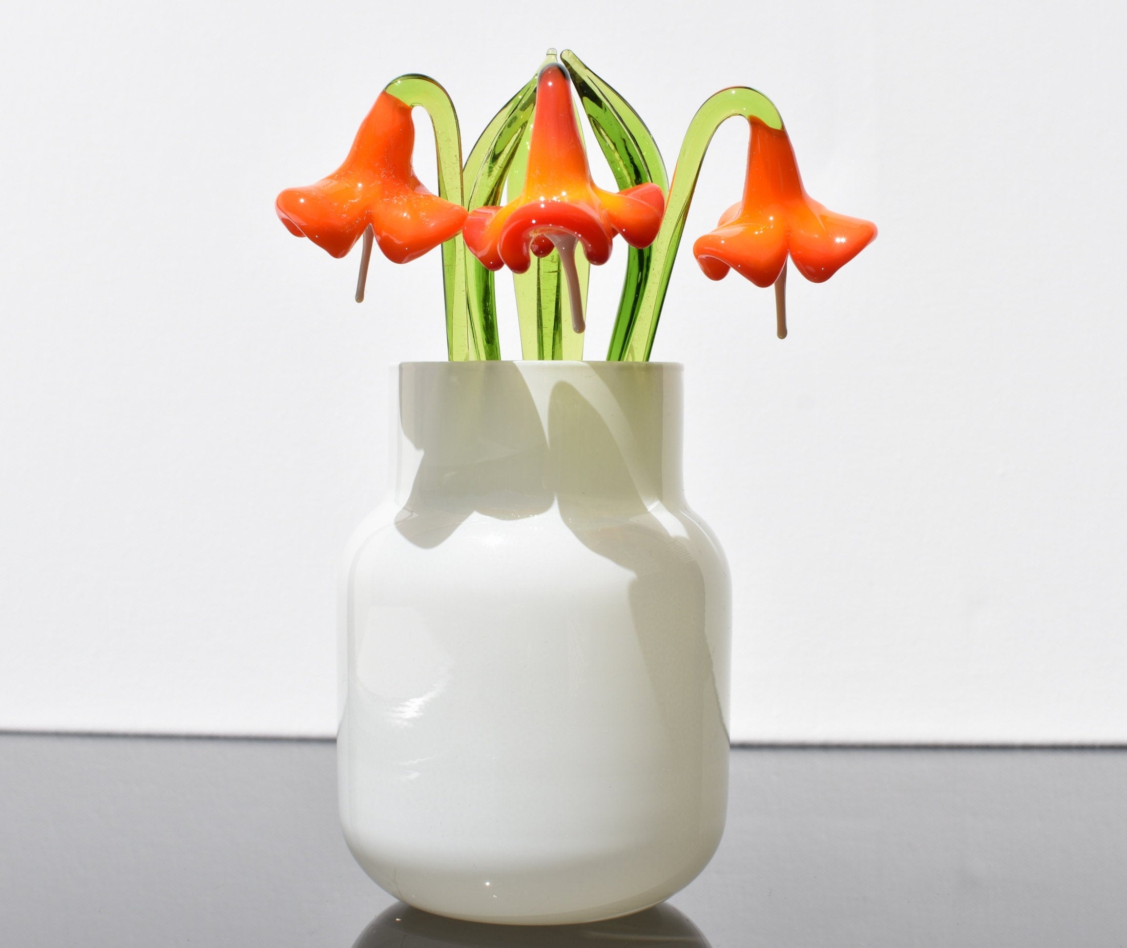 Orange petals  Jubilee  bell glass flower.  Excellent addition to your glass collection, unique gift. Each flower is priced individually.