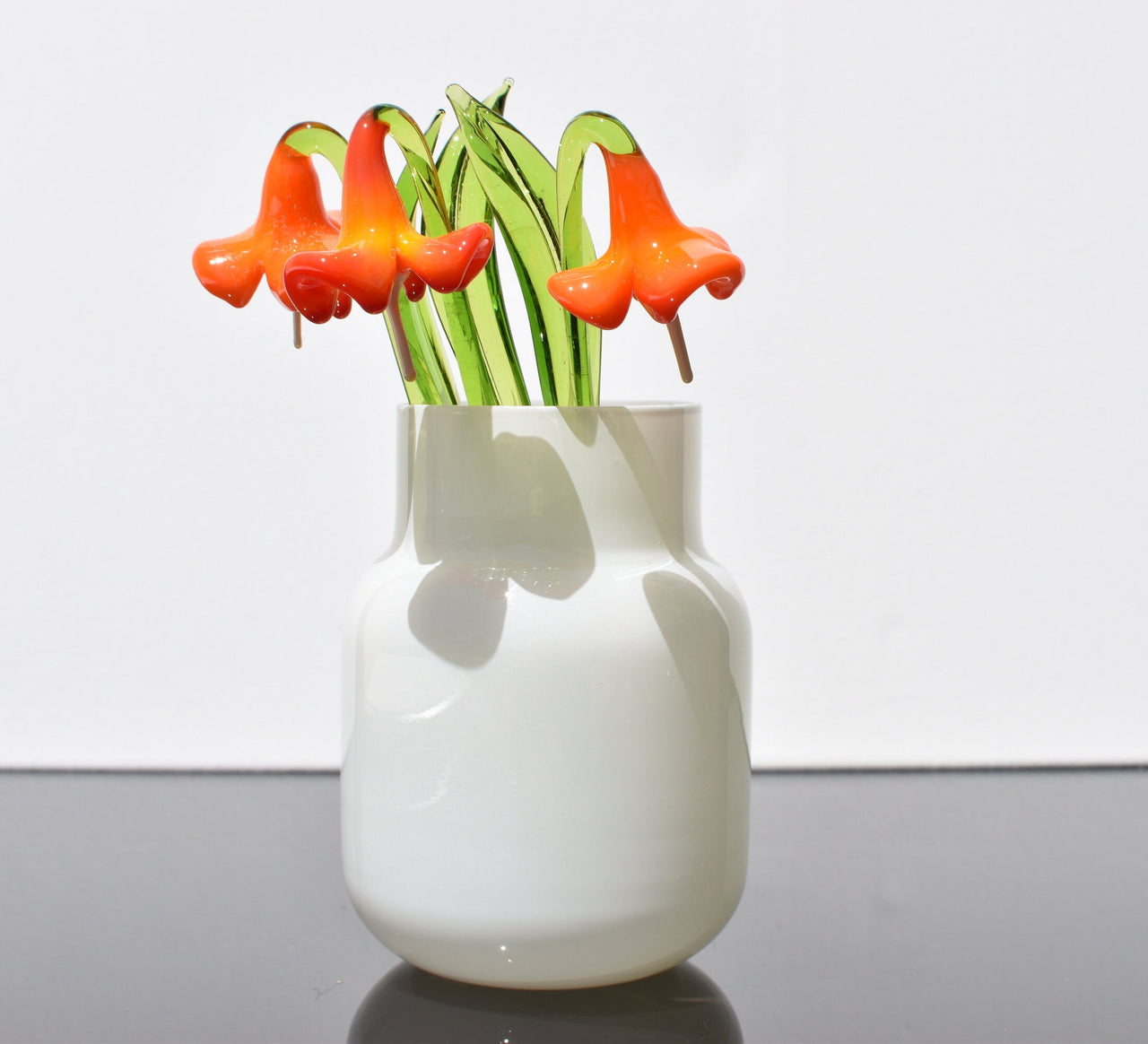 Orange petals  Jubilee  bell glass flower.  Excellent addition to your glass collection, unique gift. Each flower is priced individually.