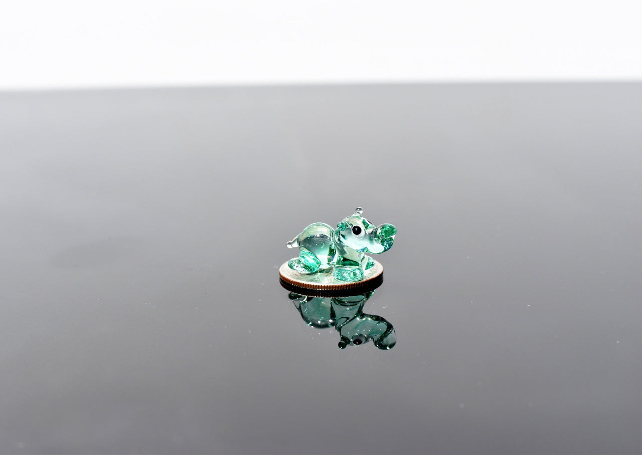 World's smallest turquoise glass Hippopotamus, whimsical, Lamp work miniature  Hippo character, Unique gift.