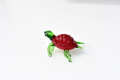 Red Glass Sea Turtle. Detailed figurine with a lot of character and personality.  Excellent addition to you glass menagerie collection