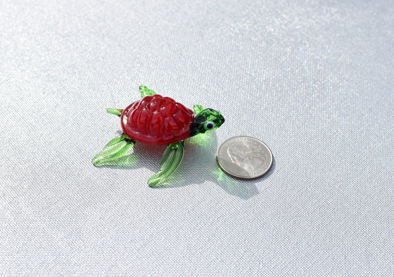 Red Glass Sea Turtle. Detailed figurine with a lot of character and personality.  Excellent addition to you glass menagerie collection