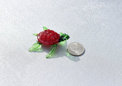 Red Glass Sea Turtle. Detailed figurine with a lot of character and personality.  Excellent addition to you glass menagerie collection