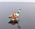 Cute glass turtle. Whimsical figurine; lot of character and personality. Excellent addition to your glass collection, unique gift.