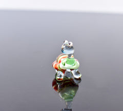 Cute glass turtle. Whimsical figurine; lot of character and personality. Excellent addition to your glass collection, unique gift.